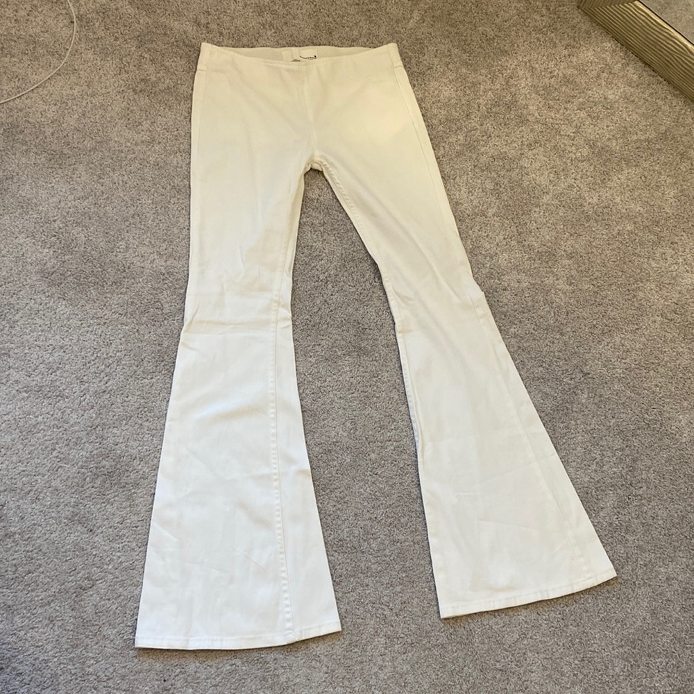Brand new White Flare elastic waist band jeans.